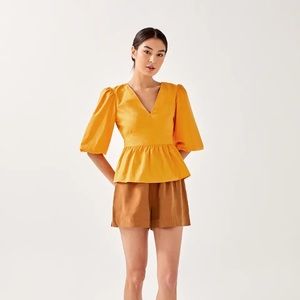 Fleuri puff sleeve peplum top